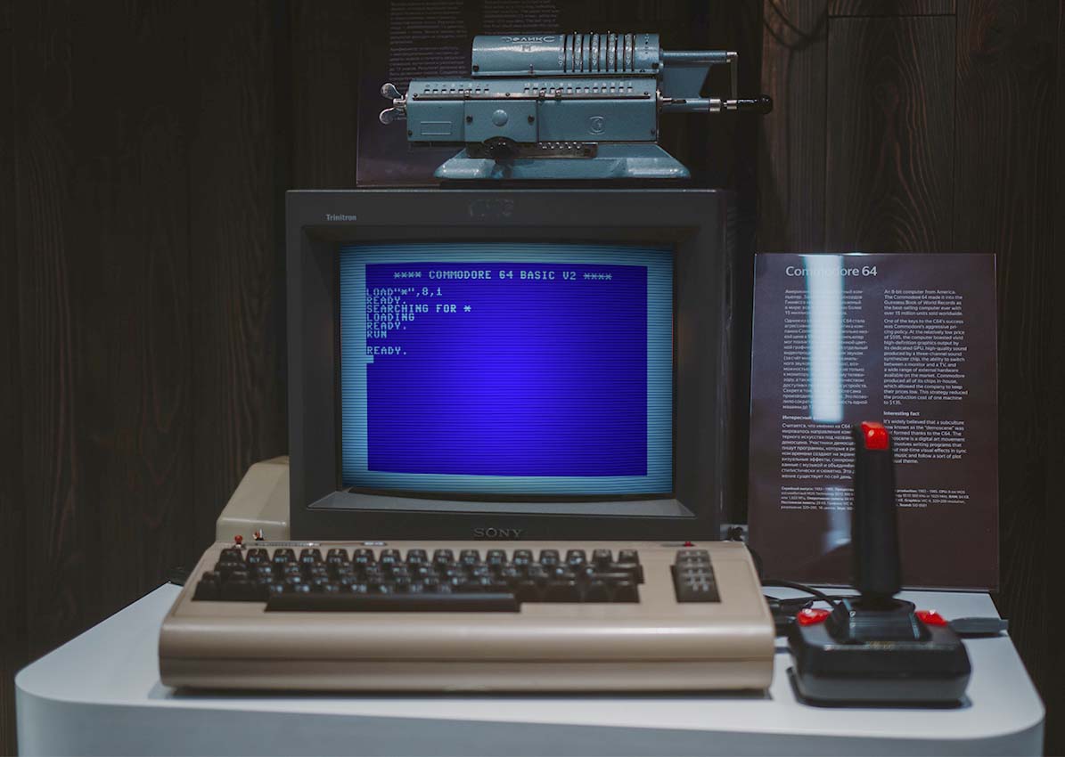 picture of commodore 64 with a sony CRT screen and a joystick